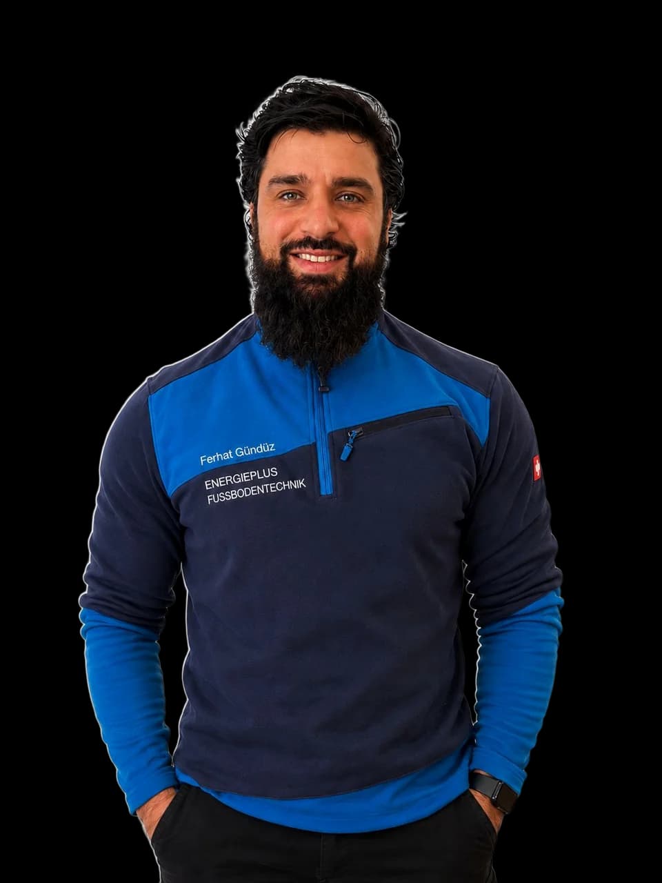 Ferhat Gündüz, Abteilungsleiter EnergiePlus Fußbodentechnik und Spezialist Fräsen, in der Arbeitskleidung der Abteilung